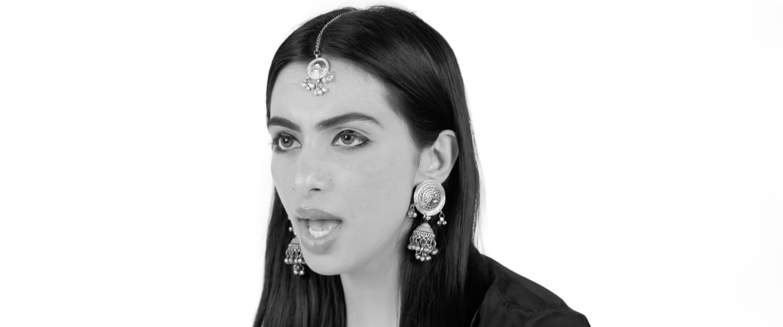 Black-and-white portrait of Ranjani Murthy wearing a maang tikka